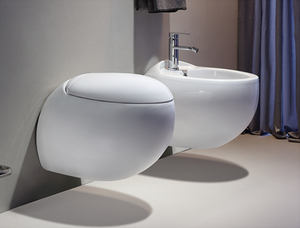 Wall hung toilet set with a wall hung bidet toilet